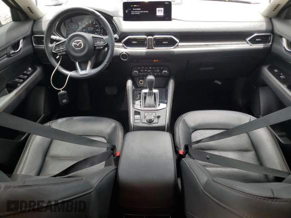 2021 Mazda CX-5 Grand Touring z VIN JM3KFBDM5M0464611, wystawiony jako Copart lot #62829065 z przebiegiem 20 525 mil mil oraz Nie do naprawy • Non repairable. Historia ofert i sprzedaży dostępna na DreamBid. Obrazek 8.