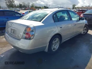2003 Nissan Altima S with VIN 1N4AL11D43C354986, listed as a IAAI auction lot 41794579 with 135,238 mi miles. Bid and sale history available at carsss.com. Image 4.