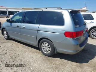 2010 Honda Odyssey EX with VIN 5FNRL3H43AB002674, listed as a IAAI auction lot 41769655 with 217,872 mi miles. Bid and sale history available at carsss.com. Image 3.