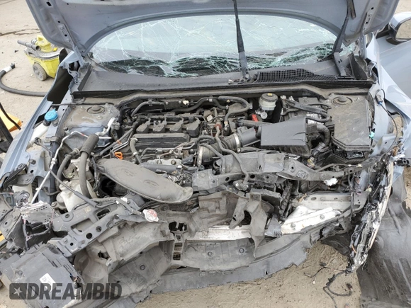 2022 Honda Civic Sport Touring z VIN 19XFL1H86NE011889, wystawiony jako Copart lot #53403415 z przebiegiem 93 619 mil mil oraz Szkoda całkowita • Salvage title. Historia ofert i sprzedaży dostępna na DreamBid. Obrazek 14.