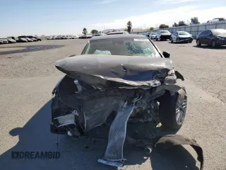 2020 Genesis G70 2.0T with VIN KMTG64LA6LU053311, listed as a Copart auction lot 71866084 with 37,754 mi miles and Salvage Title. Bid and sale history available at carsss.com. Image 5.