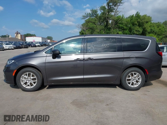 2023 Chrysler Pacifica Touring L with VIN 2C4RC1BG6PR612749, listed as a IAAI auction lot 42612932 with 69,931 mi miles and . Bid and sale history available at DreamBid. Image 14.