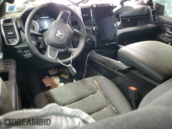 2025 Ram 1500 Big Horn with VIN 1C6SRFFPXSN591196, listed as a Copart auction lot 52577325 with 14,036 mi miles and Salvage Title. Bid and sale history available at carsss.com. Image 8.