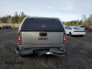 2016 GMC Canyon z VIN 1GTP6CE15G1304347, wystawiony jako Copart lot #49349625 z przebiegiem 94 829 mil mil oraz Szkoda całkowita • Salvage title. Historia ofert i sprzedaży dostępna na DreamBid. Obrazek 6.