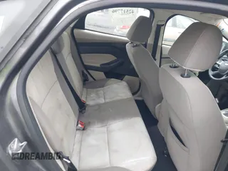 2012 Ford Focus SE z VIN 1FAHP3F29CL442731, wystawiony jako IAAI lot #42517796 z przebiegiem 148 728 mil mil oraz . Historia ofert i sprzedaży dostępna na DreamBid. Obrazek 8.