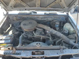1987 Nissan Hardbody E z VIN JN6ND11S1HW030629, wystawiony jako Copart lot #65657004 z przebiegiem 181 228 mil mil oraz Szkody całkowita. Historia ofert i sprzedaży dostępna na DreamBid. Obrazek 11.