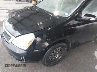 2011 Kia Sedona LX with VIN KNDMG4C71B6376011, listed as a IAAI auction lot 41600258 with 162,025 mi miles. Bid and sale history available at carsss.com. Image 13.