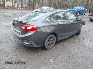 2017 Chevrolet Cruze LT with VIN 1G1BE5SM9H7116655, listed as a IAAI auction lot 41513757 with 125,544 mi miles and . Bid and sale history available at DreamBid. Image 4.
