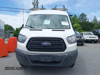 2019 Ford Transit z VIN 1FTYR1CM7KKB27266, wystawiony jako IAAI lot #42290305 z przebiegiem 129 746 mil mil oraz . Historia ofert i sprzedaży dostępna na DreamBid. Obrazek 12.