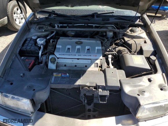 2000 Cadillac Eldorado with VIN 1G6EL12Y7YU135375, listed as a Copart auction lot 69503944 with 105,703 mi miles and Salvage Title. Bid and sale history available at carsss.com. Image 11.