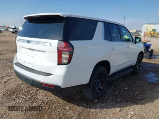 2021 Chevrolet Tahoe Commercial with VIN 1GNSKLED2MR374859, listed as a IAAI auction lot 40736376 with 83,417 mi miles and . Bid and sale history available at DreamBid. Image 4.