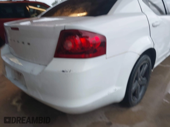 2013 Dodge Avenger SE with VIN 1C3CDZAB1DN712729, listed as a IAAI auction lot 41980859 with 250,356 mi miles and . Bid and sale history available at DreamBid. Image 16.