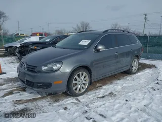 2014 Volkswagen Jetta SportWagen TDI w/Sunroof & Nav with VIN 3VWPL7AJ7EM600408, listed as a IAAI auction lot 41590312 with 133,451 mi miles. Bid and sale history available at carsss.com. Image 17.