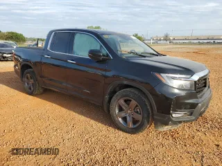 2023 Honda Ridgeline RTL-E with VIN 5FPYK3F7XPB052810, listed as a Copart auction lot 51172945 with Not provided miles and Non repairable. Bid and sale history available at DreamBid. Image 4.