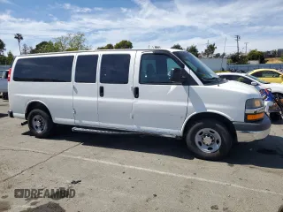 2015 Chevrolet Express Passenger LT with VIN 1GAZG1FG7F1115655, listed as a Copart auction lot 52825575 with 168,167 mi miles and Clean title. Bid and sale history available at DreamBid. Image 4.