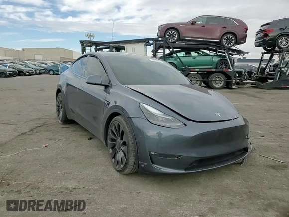 2022 Tesla Model Y Performance with VIN 7SAYGDEF1NF491967, listed as a Copart auction lot 51119515 with 50,520 mi miles and Salvage title. Bid and sale history available at DreamBid. Image 11.