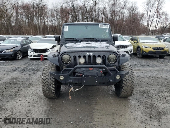 2014 Jeep Wrangler Sahara with VIN 1C4AJWBG0EL306703, listed as a Copart auction lot 51450215 with 115,932 mi miles and Salvage Title. Bid and sale history available at DreamBid. Image 5.
