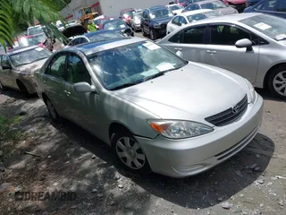 2003 Toyota Camry LE with VIN 4T1BE32K73U157902, listed as a IAAI auction lot 42248544 with 106,675 mi miles and . Bid and sale history available at DreamBid. Image 1.