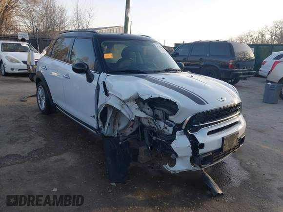 2015 MINI Cooper Countryman S with VIN WMWZC5C50FWP42324, listed as a IAAI auction lot 41795698 with 95,746 mi miles. Bid and sale history available at carsss.com. Image 1.