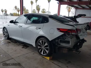 2017 Kia Optima SX with VIN 5XXGW4L2XHG136843, listed as a IAAI auction lot 41806606 with 157,899 mi miles. Bid and sale history available at carsss.com. Image 3.
