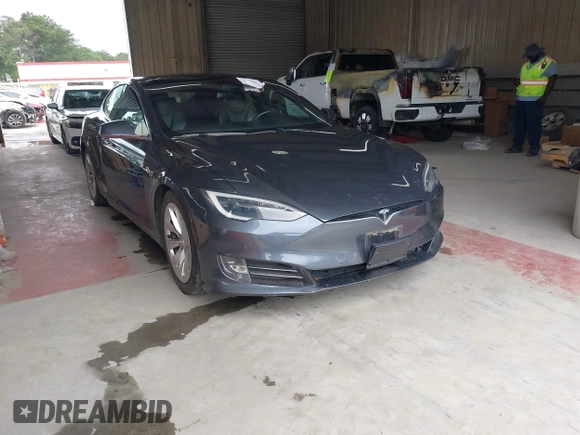2018 Tesla Model S 75D with VIN 5YJSA1E28JF298208, listed as a IAAI auction lot 42438793 with Not provided miles and . Bid and sale history available at DreamBid. Image 1.