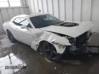 2016 Dodge Challenger R/T Plus Shaker z VIN 2C3CDZBT1GH289736, wystawiony jako IAAI lot #41563732 z przebiegiem 123 008 mil mil oraz . Historia ofert i sprzedaży dostępna na DreamBid. Obrazek 1.