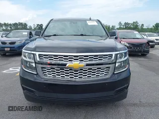 2015 Chevrolet Tahoe LT with VIN 1GNSCBKC4FR145119, listed as a IAAI auction lot 42309931 with 99,408 mi miles and . Bid and sale history available at DreamBid. Image 12.