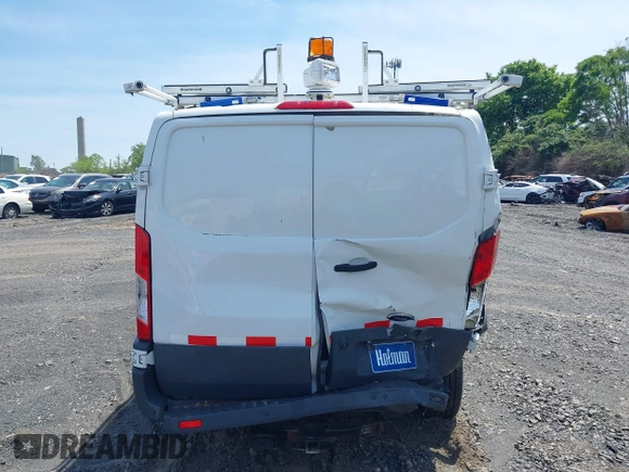 2016 Ford Transit Cargo z VIN 1FTYR1YM0GKB55605, wystawiony jako IAAI lot #42211489 z przebiegiem Nie podano mil oraz . Historia ofert i sprzedaży dostępna na DreamBid. Obrazek 16.