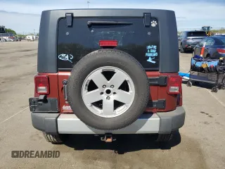 2008 Jeep Wrangler Unlimited Sahara with VIN 1J4GA59168L534967, listed as a Copart auction lot 54894635 with 180,581 mi miles and Salvage title. Bid and sale history available at DreamBid. Image 6.