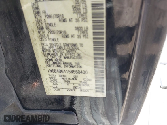2005 Nissan Titan XE with VIN 1N6BA06A15N560400, listed as a IAAI auction lot 41656560 with 212,568 mi miles. Bid and sale history available at carsss.com. Image 9.