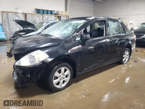 2011 Nissan Versa S with VIN 3N1BC1AP7BL410790, listed as a Copart auction lot 83893614 with 151,077 mi miles and Salvage title. Bid and sale history available at DreamBid. Image 1.
