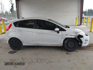 2013 Ford Fiesta S with VIN 3FADP4TJ4DM226897, listed as a IAAI auction lot 41916651 with 56,714 mi miles and . Bid and sale history available at DreamBid. Image 12.
