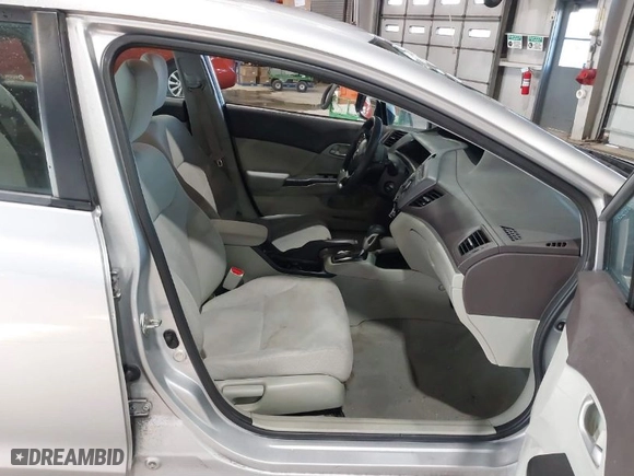 2012 Honda Civic Sdn LX with VIN 19XFB2F58CE067475, listed as a IAAI auction lot 41781509 with 126,657 mi miles. Bid and sale history available at carsss.com. Image 5.
