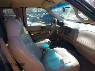 1999 Ford F-150 XL with VIN 2FTRX07L3XCA60067, listed as a IAAI auction lot 41887212 with 176,034 mi miles. Bid and sale history available at carsss.com. Image 5.