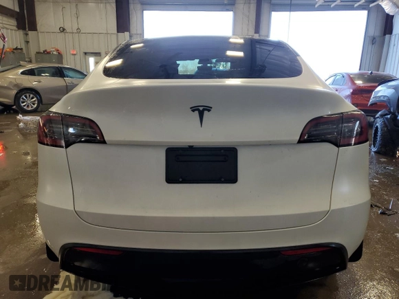 2023 Tesla Model Y Long Range z VIN 7SAYGAEE5PF672546, wystawiony jako Copart lot #42779065 z przebiegiem 27 570 mil mil oraz Nie do naprawy • Non repairable. Historia ofert i sprzedaży dostępna na DreamBid. Obrazek 6.