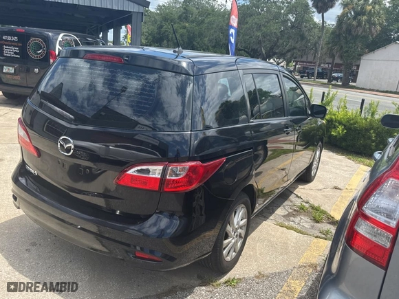 2015 Mazda Mazda5 Sport with VIN JM1CW2BLXF0182880, listed as a Copart auction lot 59904084 with 100,383 mi miles. Bid and sale history available at carsss.com. Image 4.