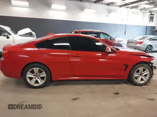 2015 BMW 4 Series 428i xDrive with VIN WBA3N5C50FK197930, listed as a IAAI auction lot 42063189 with 90,206 mi miles and . Bid and sale history available at DreamBid. Image 14.