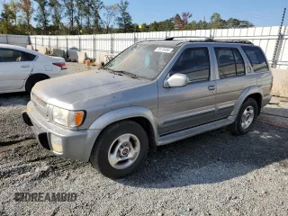 2000 Infiniti QX4 with VIN JNRAR07Y6YW081763, listed as a Copart auction lot 75116494 with 297,205 mi miles and Salvage Title. Bid and sale history available at DreamBid. Image 1.