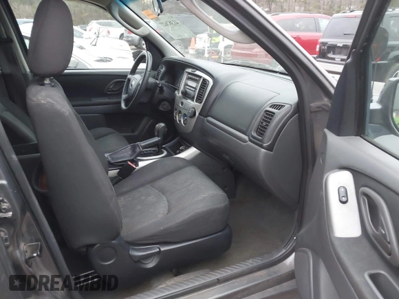 2006 Mazda Tribute S with VIN 4F2YZ04196KM12510, listed as a IAAI auction lot 41382627 with 242,650 mi miles and . Bid and sale history available at DreamBid. Image 5.