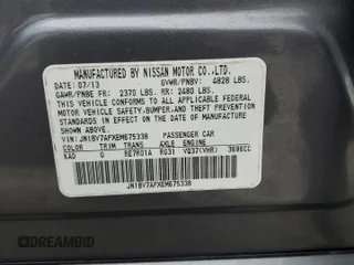 2014 Infiniti Q50 Premium with VIN JN1BV7APXEM675338, listed as a Copart auction lot 57125045 with 58,267 mi miles and Salvage title. Bid and sale history available at DreamBid. Image 12.