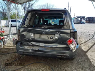 2007 Honda Pilot EX-L with VIN 5FNYF18777B012649, listed as a IAAI auction lot 42070873 with 167,419 mi miles and . Bid and sale history available at DreamBid. Image 16.