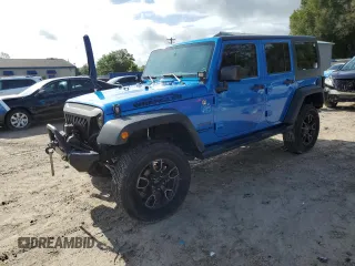 2015 Jeep Wrangler Unlimited Sport with VIN 1C4BJWDG1FL683558, listed as a Copart auction lot 59883545 with 107,267 mi miles and Salvage title. Bid and sale history available at DreamBid. Image 1.