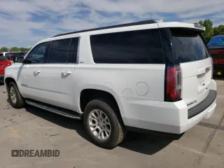 2019 GMC Yukon XL SLT with VIN 1GKS2GKC5KR362816, listed as a Copart auction lot 69062794 with 96,321 mi miles and Salvage Title. Bid and sale history available at DreamBid. Image 2.