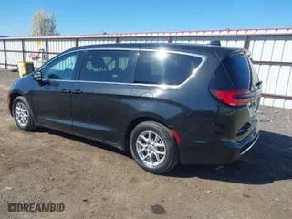 2023 Chrysler Pacifica Touring L with VIN 2C4RC1BG3PR533863, listed as a IAAI auction lot 42067253 with 61,868 mi miles. Bid and sale history available at carsss.com. Image 3.