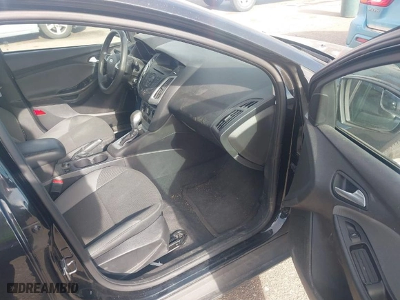 2014 Ford Focus SE with VIN 1FADP3F28EL432306, listed as a IAAI auction lot 41862236 with 136,882 mi miles. Bid and sale history available at carsss.com. Image 5.
