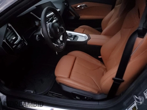 2024 BMW Z4 sDriveM40i with VIN WBAHF9C02RWY35106, listed as a Copart auction lot 82878254 with 3,199 mi miles and Salvage title. Bid and sale history available at DreamBid. Image 7.