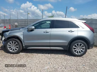 2023 Cadillac XT4 FWD Premium Luxury with VIN 1GYFZCR45PF199216, listed as a IAAI auction lot 42762273 with 54,808 mi miles and . Bid and sale history available at DreamBid. Image 14.