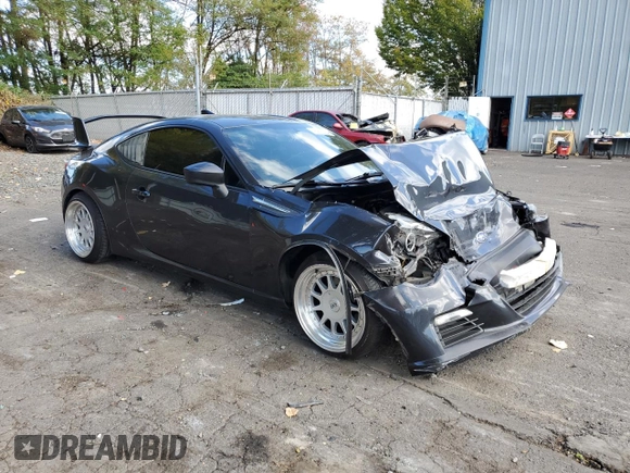 2015 Subaru BRZ Premium with VIN JF1ZCAB18F9602102, listed as a Copart auction lot 75958264 with 72,692 mi miles and Salvage title. Bid and sale history available at DreamBid. Image 4.