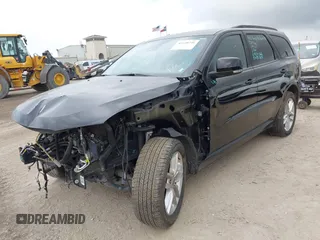 2023 Dodge Durango GT with VIN 1C4RDJDG9PC677551, listed as a IAAI auction lot 42420746 with Not provided miles and . Bid and sale history available at DreamBid. Image 2.