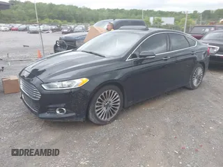 2016 Ford Fusion Titanium with VIN 3FA6P0K97GR118922, listed as a IAAI auction lot 42121212 with 256,584 mi miles and . Bid and sale history available at DreamBid. Image 17.